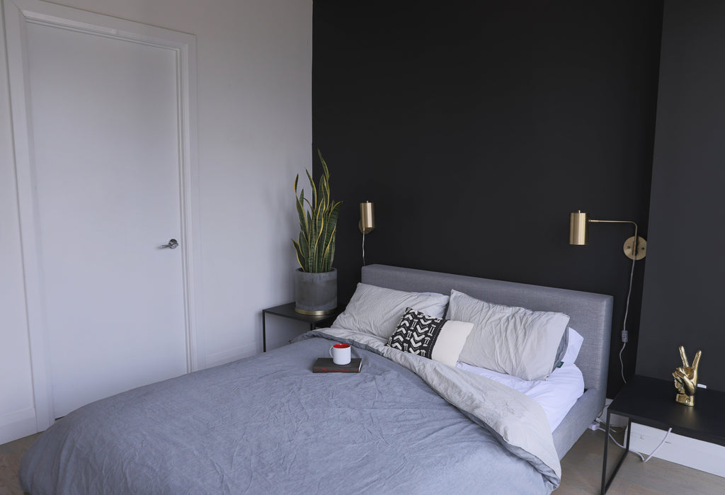 files/photo-of-a-bedroom-with-black-and-gold-design.jpg